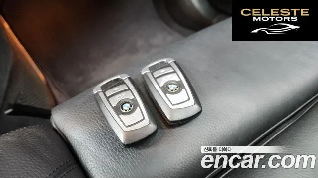 BMW Série 7 (F01) 740i M Sport 2012 — photo 18 sur 26