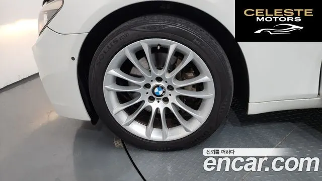 BMW Série 7 (F01) 740i M Sport 2012 — photo 5 sur 26