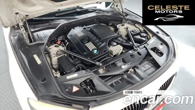 BMW Série 7 (F01) 740i M Sport 2012 — photo 6 sur 26