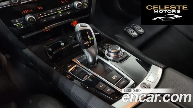 BMW Série 7 (F01) 740i M Sport 2012 — photo 9 sur 26