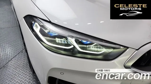 BMW Série 8 (G15) M850i xDrive Coupé 2022 — photo 7 sur 31