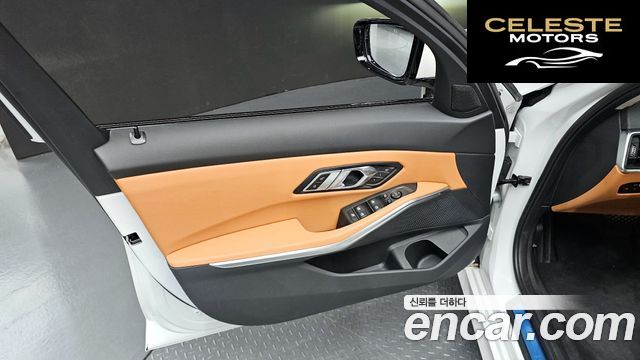 BMW Série 3 (G20) 320i 2023 — photo 13 sur 38