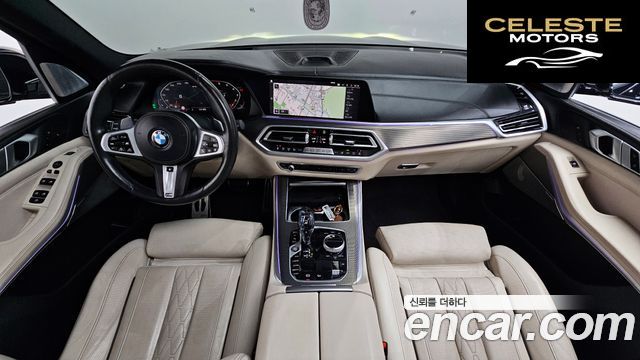 BMW X5 (G05) M50i 2021 — photo 10 sur 39