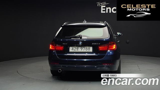 BMW Série 3 (F30) 320d xDrive Touring 2014 — photo 4 sur 20