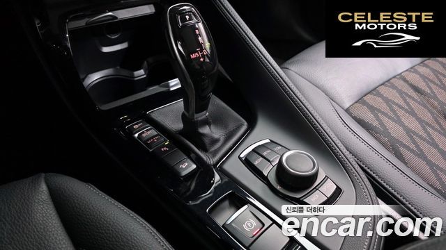 BMW X1 (F48) xDrive 18d xLine 2021 — photo 12 sur 41
