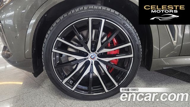 BMW X5 (G05) M50i 2023 — photo 5 sur 26