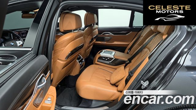 BMW Série 7 (G11) 730d xDrive Design Pure Excellence 2021 — photo 12 sur 26