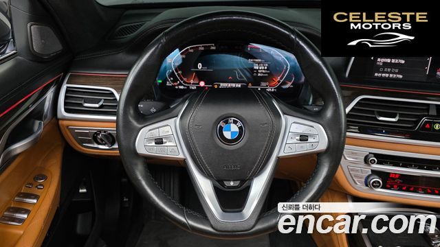 BMW Série 7 (G11) 730d xDrive Design Pure Excellence 2021 — photo 14 sur 26