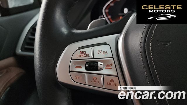 BMW X7 (G07) xDrive 40i Design Pure Excellence 7 places 2021 — photo 22 sur 35