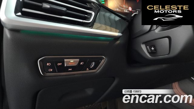 BMW X7 (G07) xDrive 40i Design Pure Excellence 7 places 2021 — photo 30 sur 35