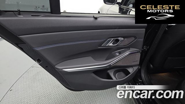 BMW Série 3 (G20) 320d Touring M Sport 2021 — photo 14 sur 39