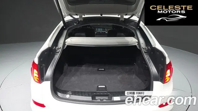 BMW Série 5 GT (F07) GT 30d 2012 — photo 20 sur 20