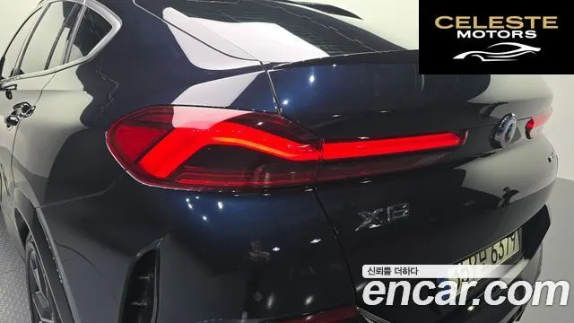 BMW X6 (G06) xDrive40i M Sport 2021 — photo 9 sur 34