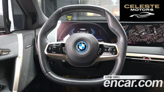 BMW iX xDrive50 Sport Plus 2022 — photo 13 sur 20