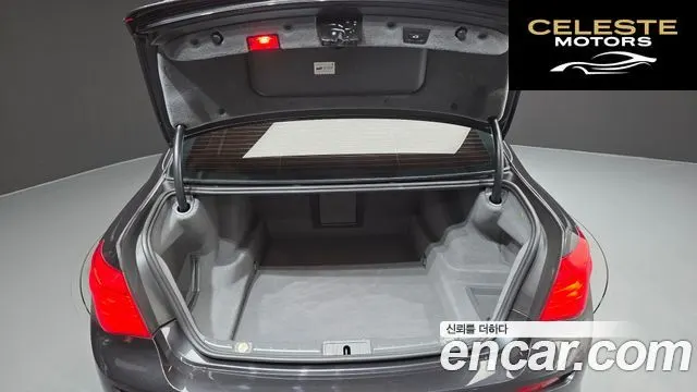 BMW Série 7 (F01) 740i M Sport 2010 — photo 20 sur 20