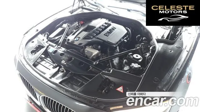 BMW Série 7 (F01) 740i M Sport 2010 — photo 6 sur 20