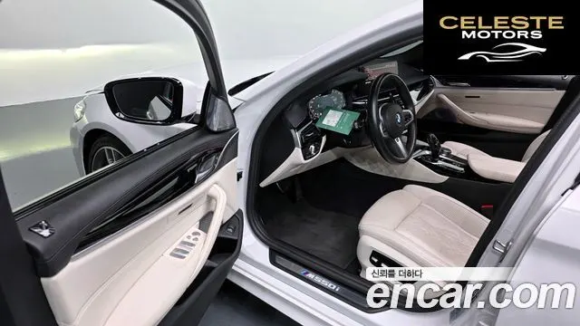 BMW Série 5 (G30) M550i xDrive 2023 — photo 13 sur 32