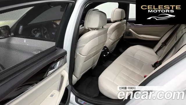 BMW Série 5 (G30) M550i xDrive 2023 — photo 18 sur 32