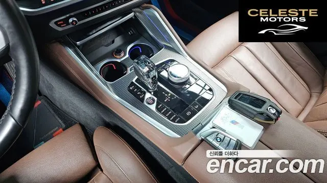 BMW X6 (G06) xDrive40i M Sport 2021 — photo 12 sur 31