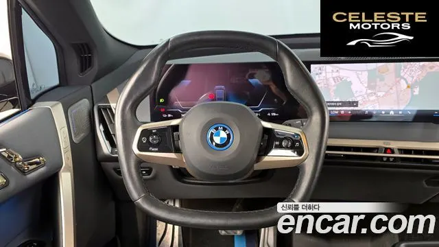 BMW iX xDrive50 Sport Plus 2023 — photo 19 sur 33