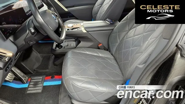 BMW iX xDrive50 Sport Plus 2023 — photo 30 sur 33