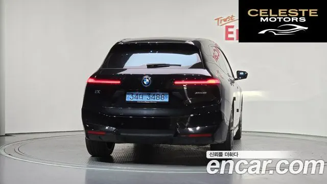 BMW iX xDrive50 Sport Plus 2023 — photo 4 sur 33