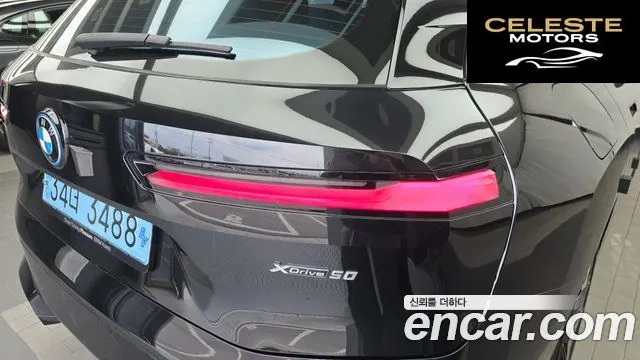 BMW iX xDrive50 Sport Plus 2023 — photo 9 sur 33