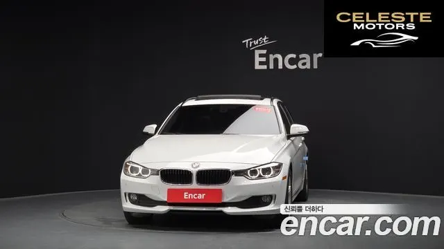 BMW Série 3 (F30) 320d Touring 2013 — photo 2 sur 40