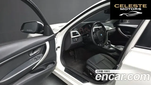 BMW Série 3 (F30) 320d Touring 2013 — photo 12 sur 40