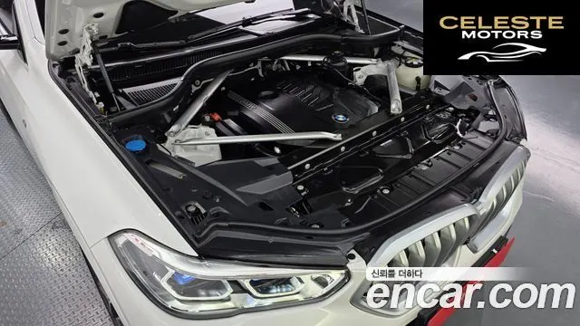 BMW X6 (G06) xDrive40i M Sport 2021 — photo 6 sur 36