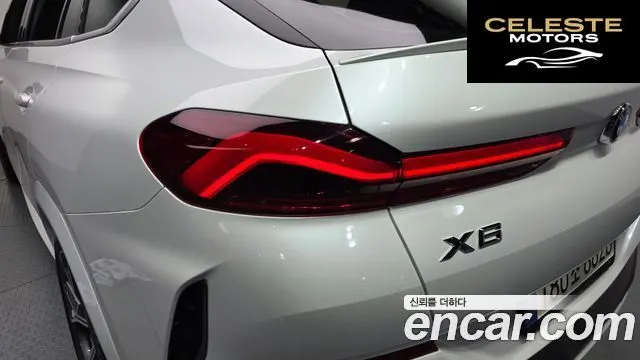 BMW X6 (G06) xDrive40i M Sport 2021 — photo 9 sur 36