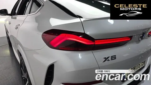 BMW X6 (G06) xDrive40i M Sport 2023 — photo 9 sur 34